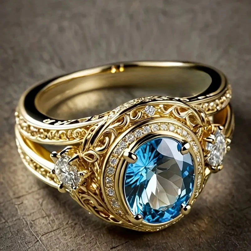 Gorgeous Women Rings with Oval Blue Cubic Zirconia Hollow Out Gold Color Wedding Band Accessories Lady Jewelry for Party