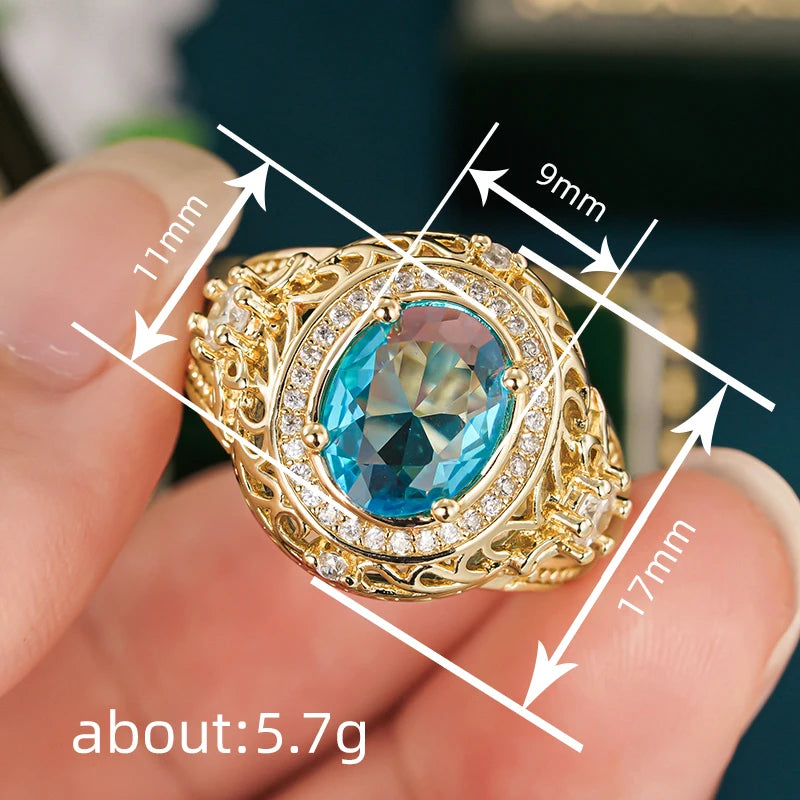 Gorgeous Women Rings with Oval Blue Cubic Zirconia Hollow Out Gold Color Wedding Band Accessories Lady Jewelry for Party