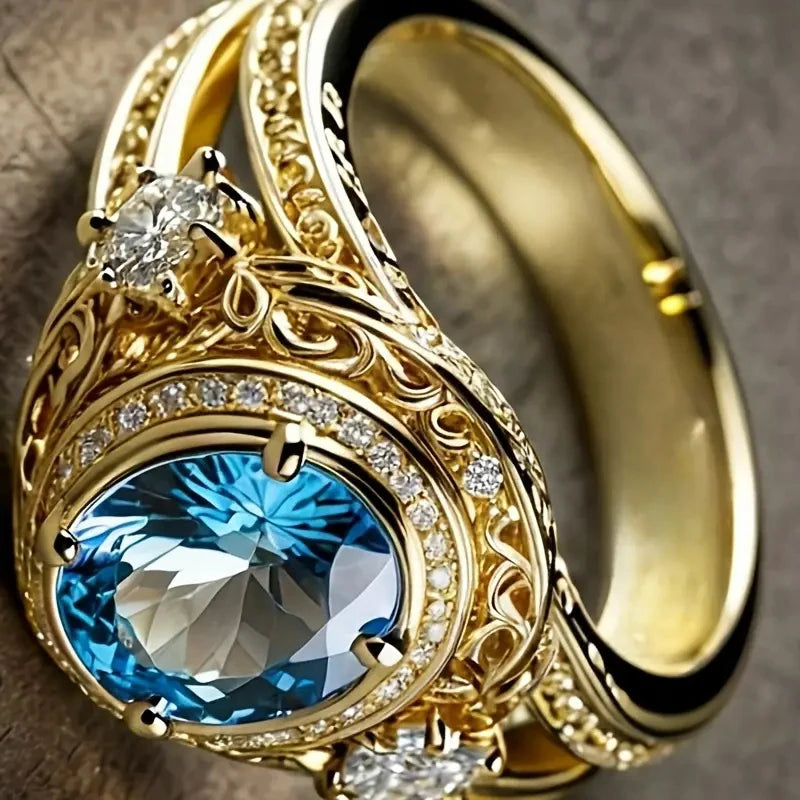Gorgeous Women Rings with Oval Blue Cubic Zirconia Hollow Out Gold Color Wedding Band Accessories Lady Jewelry for Party